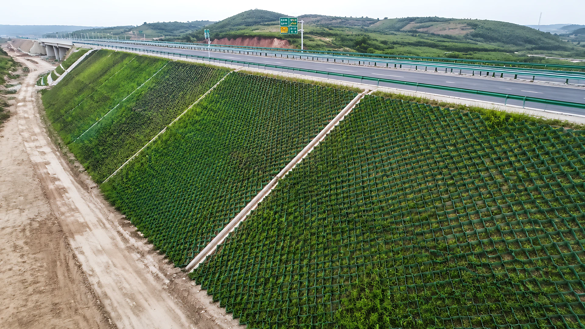 Geocell slope protection on highway embankment